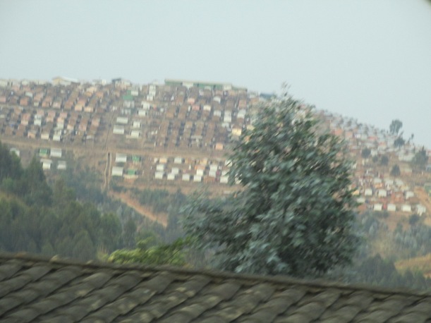 Driving by a refugee camp south of Kigali. Most of the refugees here are from the DRC.